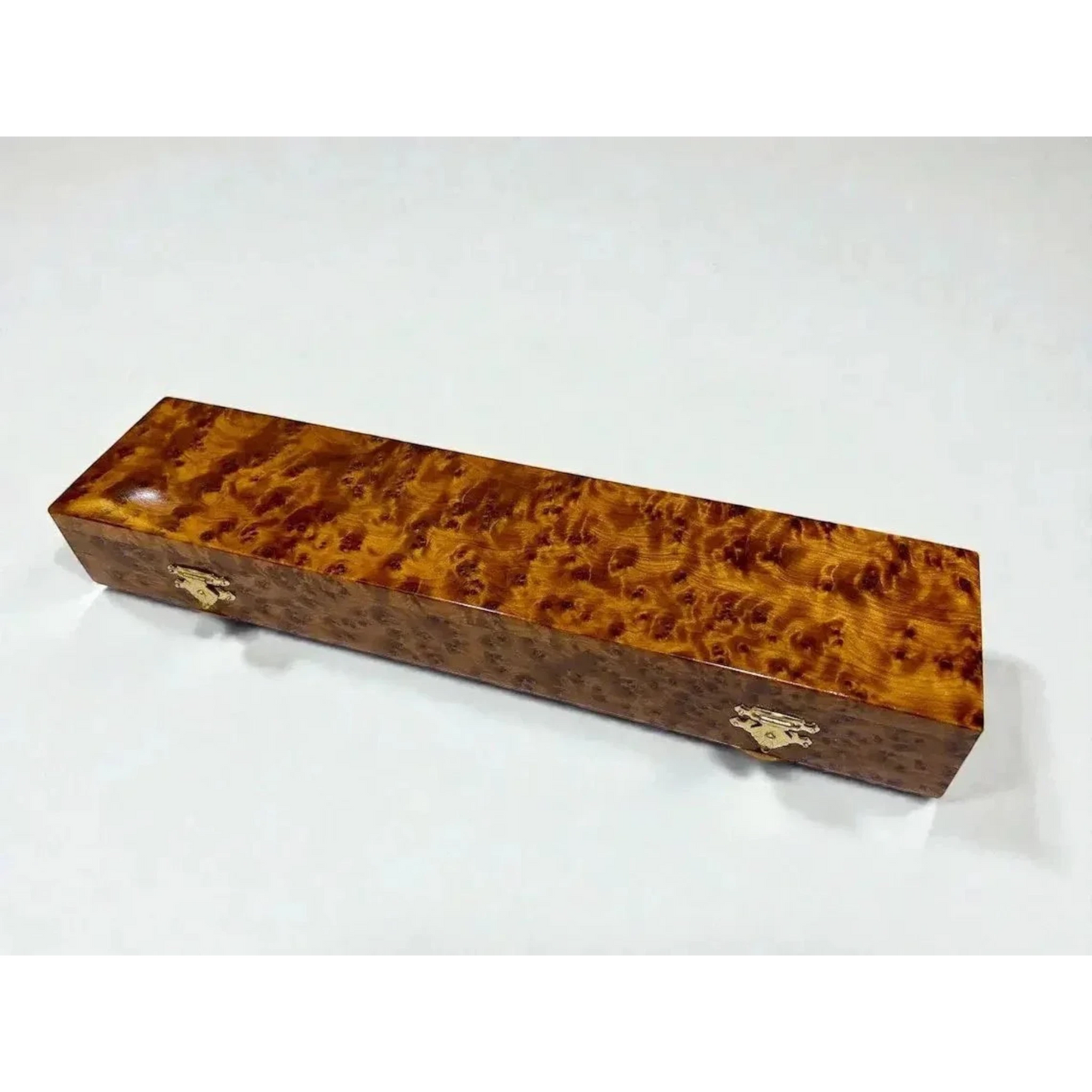 AtlasMuseCrafts elegant Thuya burl wood box with brass hardware accents and a polished finish, ideal for display or storage.