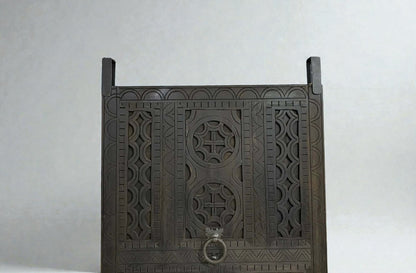 AtlasMuseCrafts dark wood door with intricate traditional floral carvings and a metal ring pull. Suitable for indoor or outdoor use.