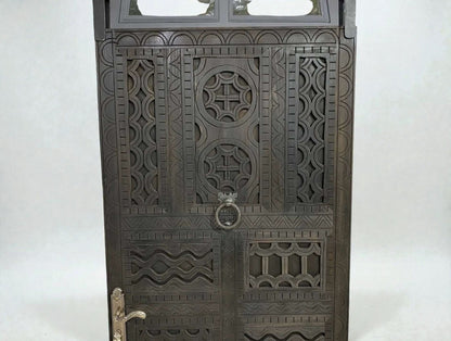 AtlasMuseCrafts dark wood door with intricate traditional floral carvings and a circular door knocker.