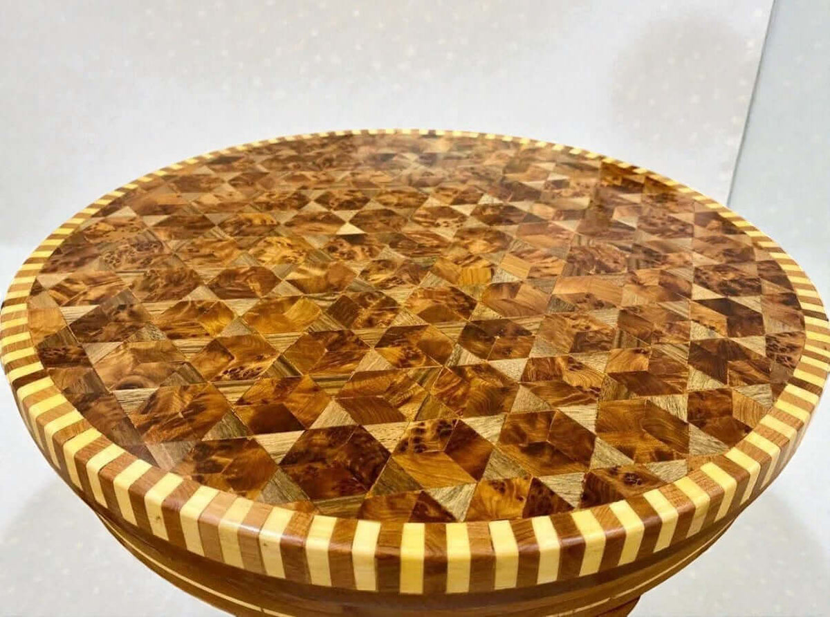 Handmade wooden coffee table with geometric mosaic top