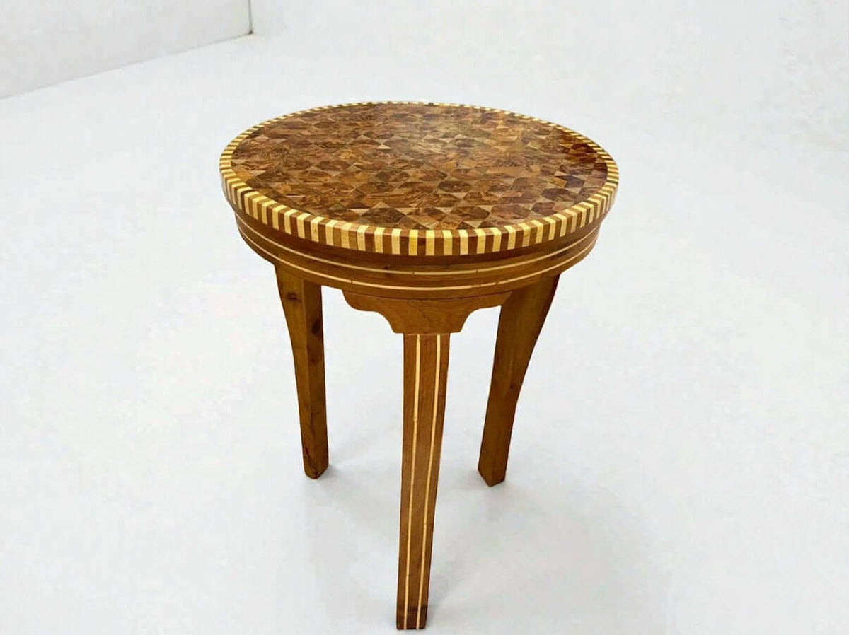 Round handmade coffee table with Moroccan mosaic inlay