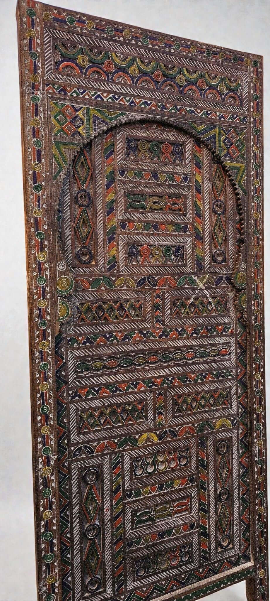 AtlasMuseCrafts Moroccan antique style door with intricate Moorish hand-carving in natural wood with colorful accents.