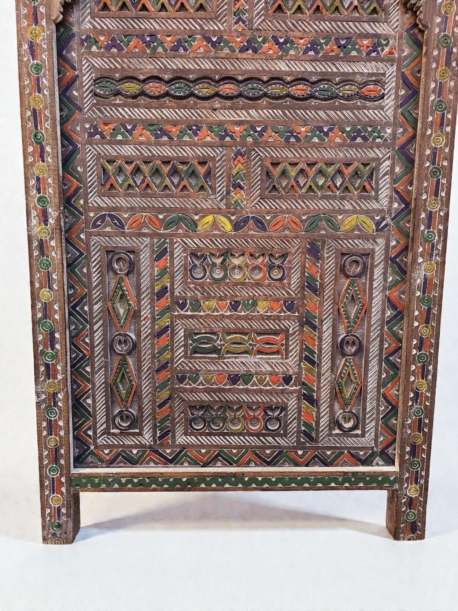 AtlasMuseCrafts Moroccan antique style door with intricate hand-carving in geometric and arabesque patterns, accented with colorful paint.