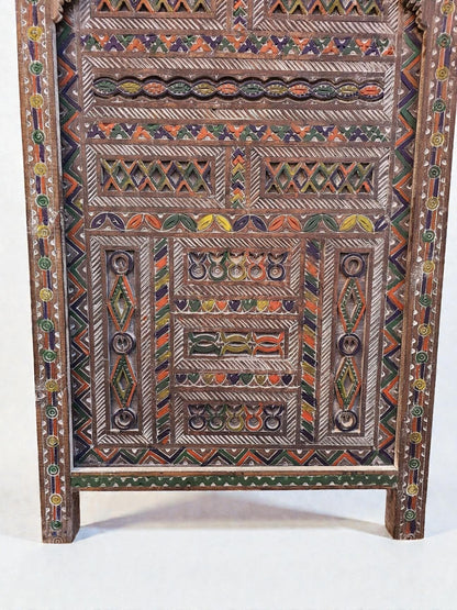 AtlasMuseCrafts Moroccan antique style door with intricate hand-carving in geometric and arabesque patterns, accented with colorful paint.