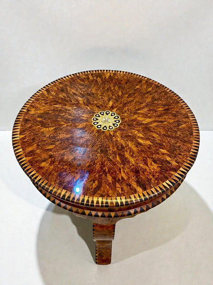 AtlasMuseCrafts handmade Moroccan Thuya wood coffee table with intricate inlaid geometric pattern and central floral inlay.