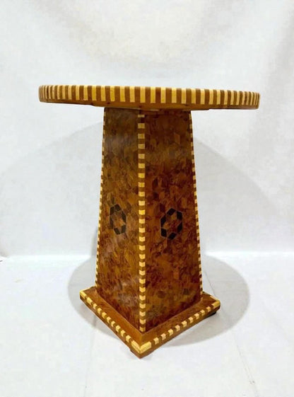 AtlasMuseCrafts handmade Moroccan solid wood dining table with intricate geometric inlay and natural wood grain.