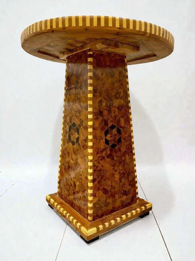 Solid wood dining table handmade in Morocco with geometric inlay pedestal