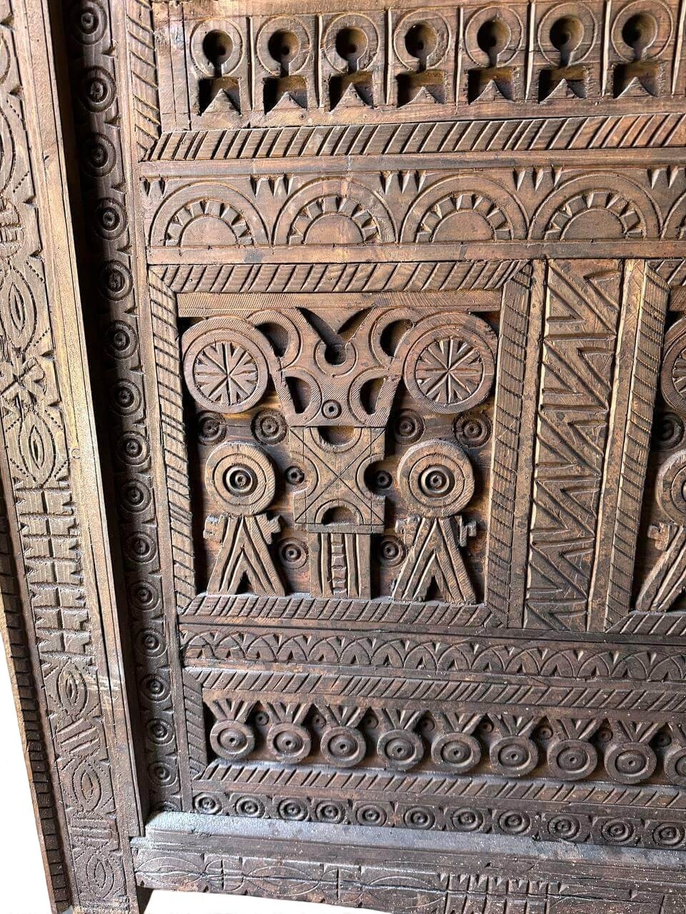 AtlasMuseCrafts custom Moroccan handmade wood door with intricate geometric carvings. Natural wood finish.
