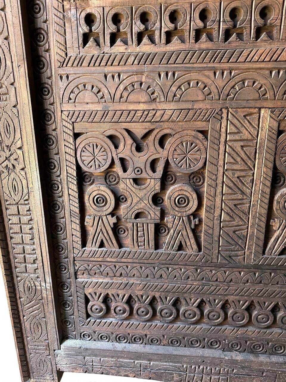 AtlasMuseCrafts custom Moroccan handmade wood door with intricate geometric carvings. Natural wood finish.