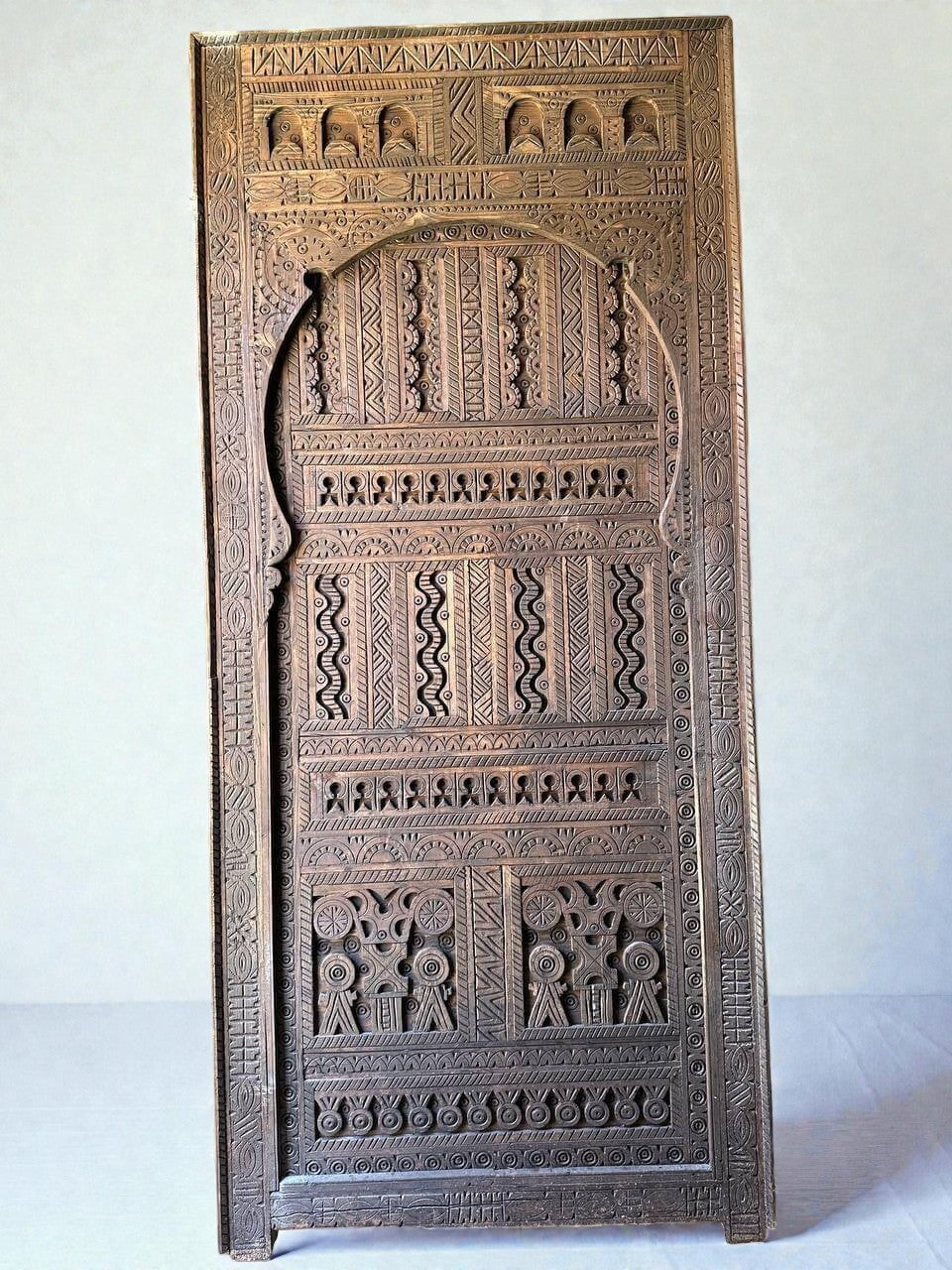 AtlasMuseCrafts custom Moroccan handmade wood door with intricate geometric carvings. Natural wood finish.