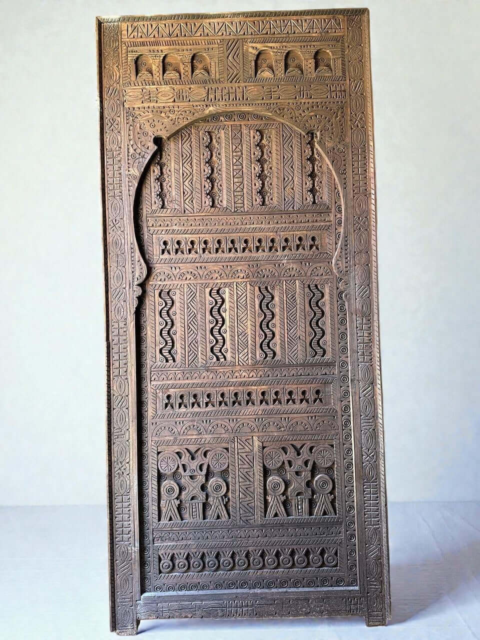 AtlasMuseCrafts custom Moroccan handmade wood door with intricate geometric carvings. Natural wood finish.