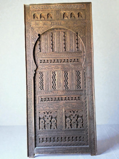 AtlasMuseCrafts custom Moroccan handmade wood door with intricate geometric carvings. Natural wood finish.