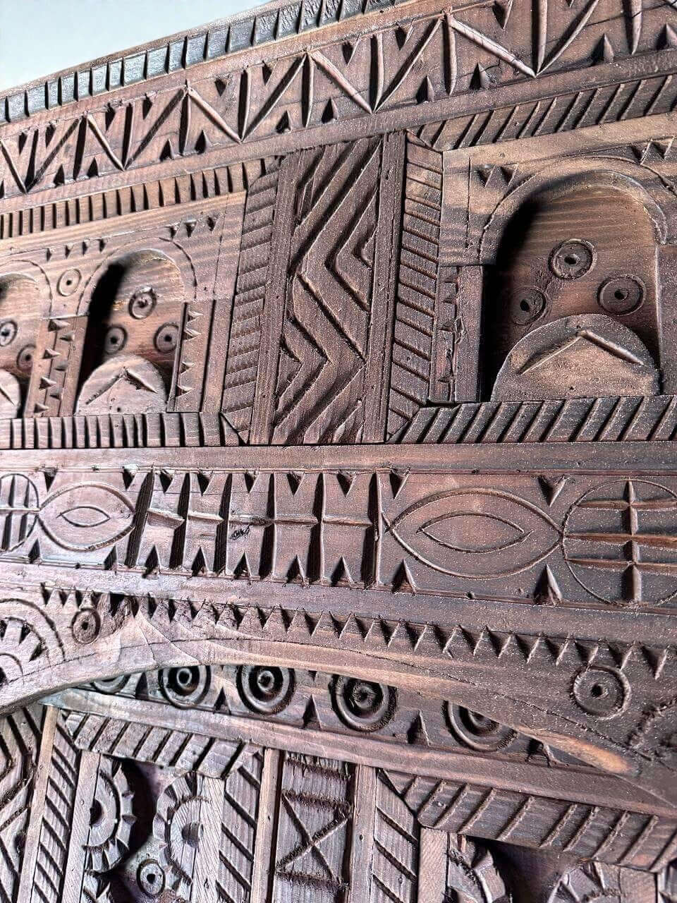 AtlasMuseCrafts dark wood Moroccan door with intricate geometric hand-carving, suitable for indoor or outdoor use.
