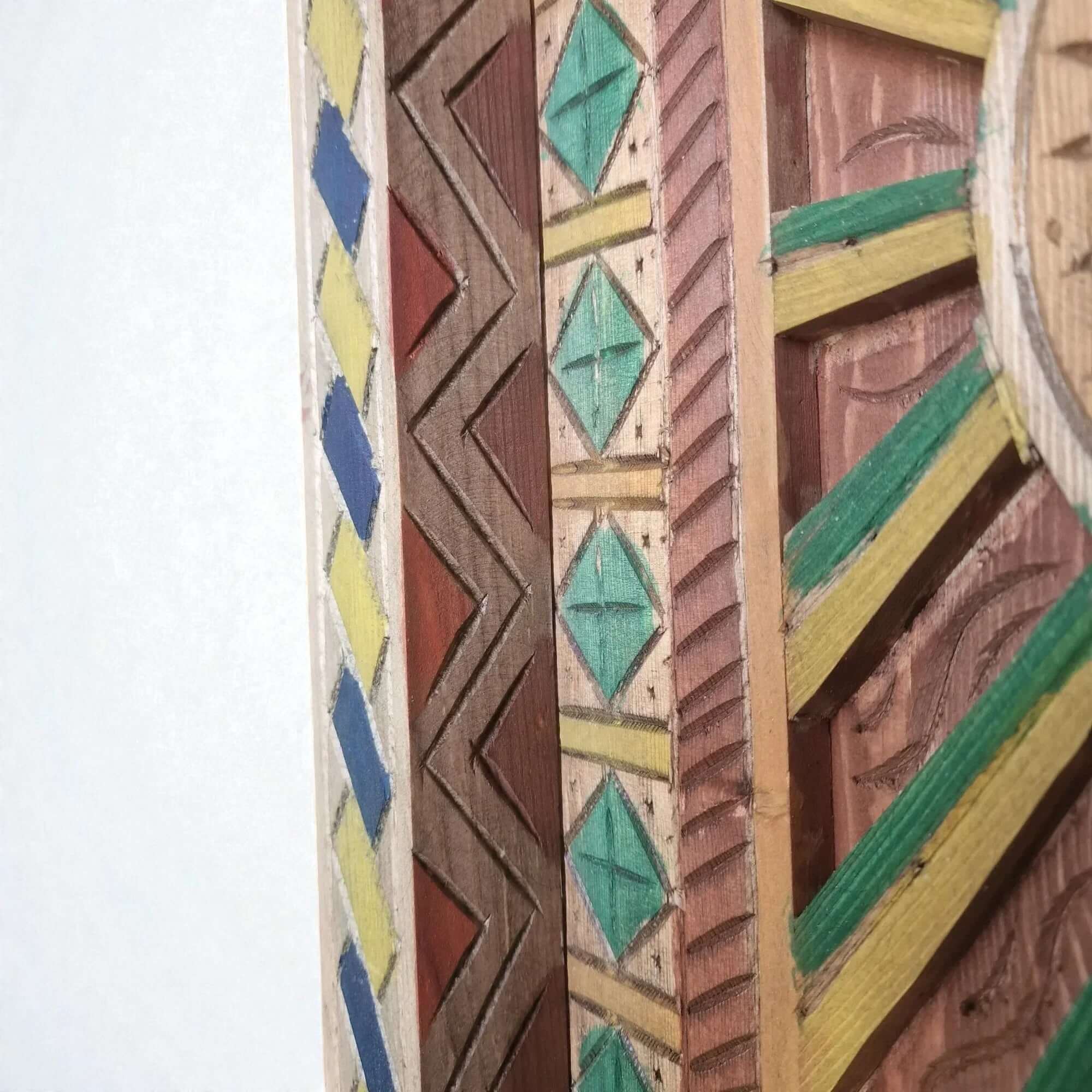 AtlasMuseCrafts hand-painted multicolor Moroccan wood door with geometric carving in blue, yellow, red, and green.