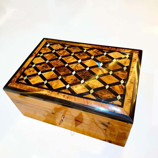 Luxury Wooden Jewelry Box made of Thuya burl wood with intricate Moroccan craftsmanship and a lockable design.