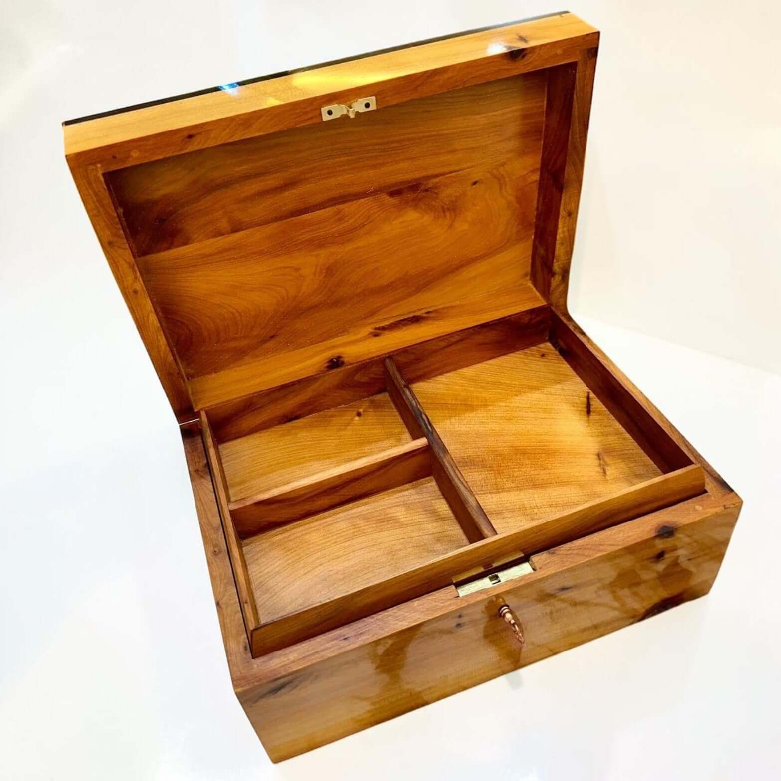 Luxury Wooden Jewelry Box with compartments, handcrafted from Thuya burl wood, showcasing rich amber color, perfect for organizing jewelry.