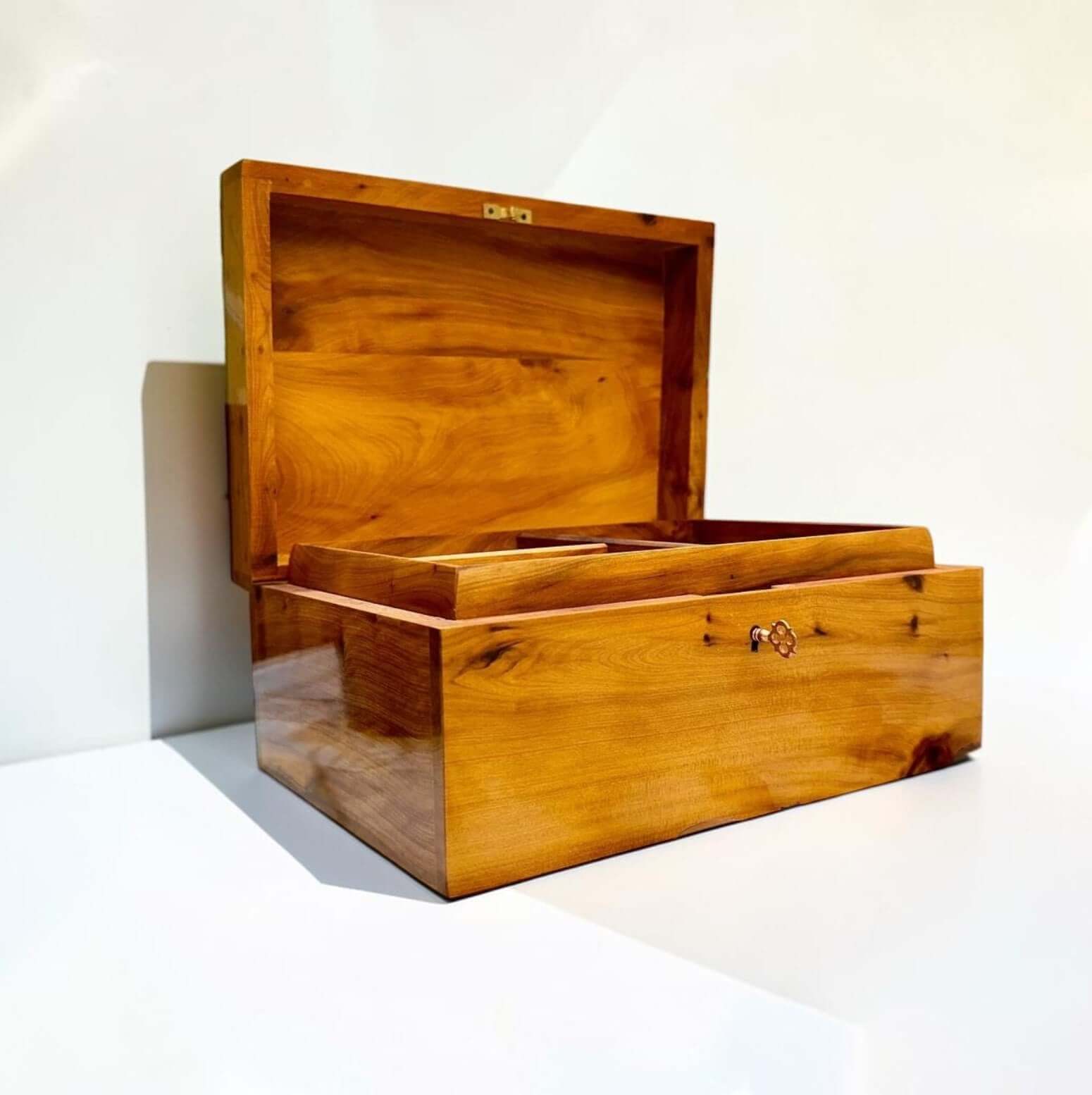 Luxury Wooden Jewelry Box made from Thuya burl wood, handcrafted with a rich amber finish and lockable design.