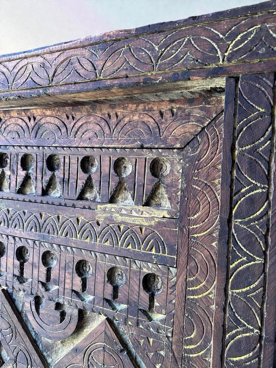 AtlasMuseCrafts vintage wooden door with floral carving and antique brass knob. Natural wood finish.