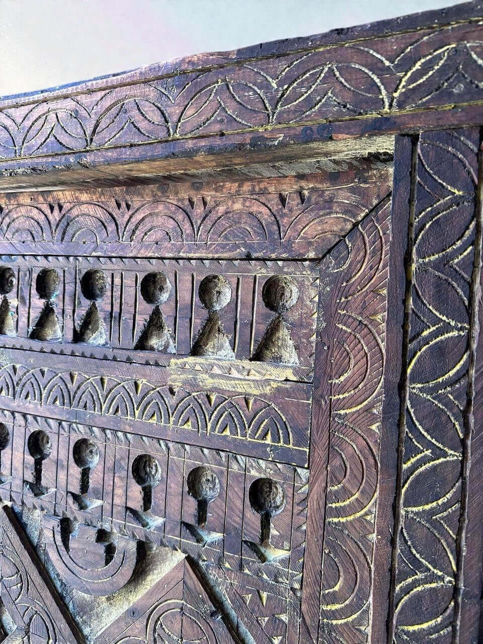 AtlasMuseCrafts vintage wooden door with floral carving and antique brass knob. Natural wood finish.