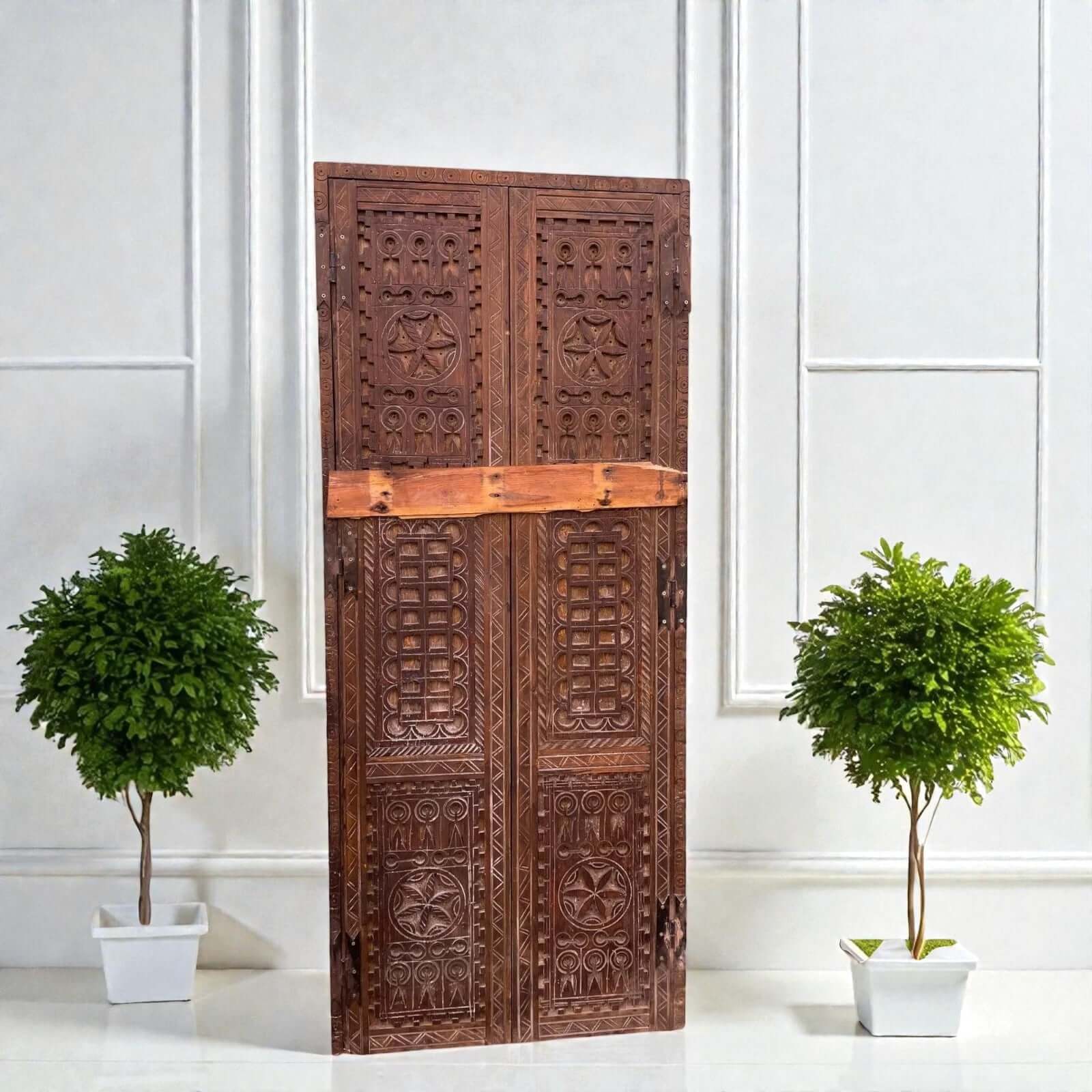 AtlasMuseCrafts natural wood double panel door with intricate hand-carved geometric motifs. Grand entry.
