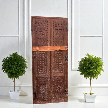 AtlasMuseCrafts natural wood double panel door with intricate hand-carved geometric motifs. Grand entry.