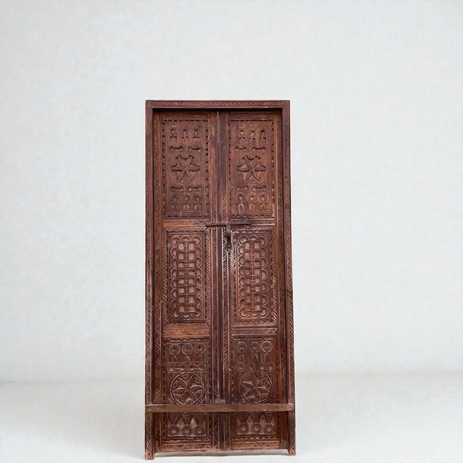 AtlasMuseCrafts double panel wooden door with intricate hand-carved geometric motifs in natural wood finish.