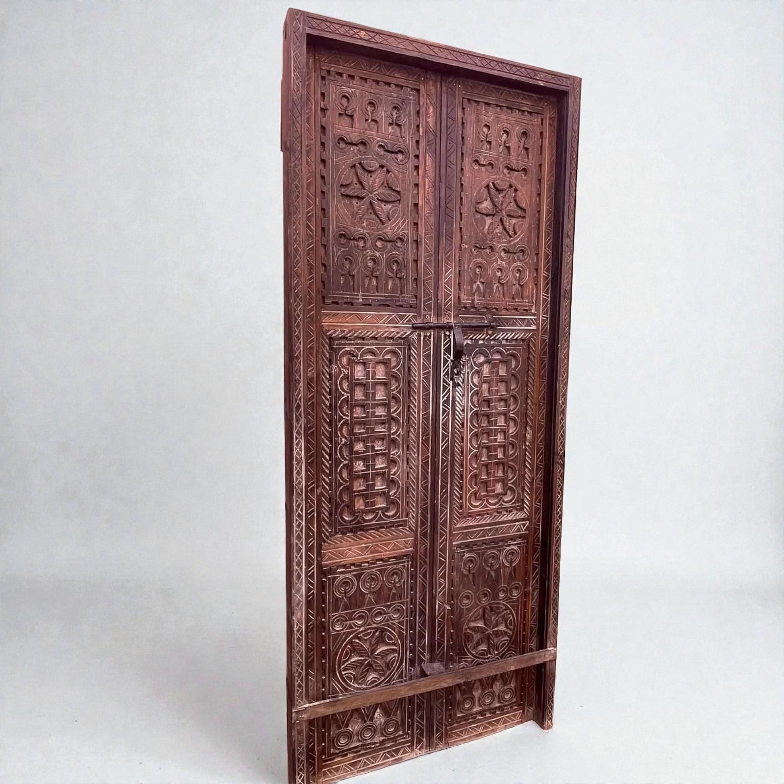 AtlasMuseCrafts hand-carved wooden double panel door with intricate geometric motifs in natural wood finish.