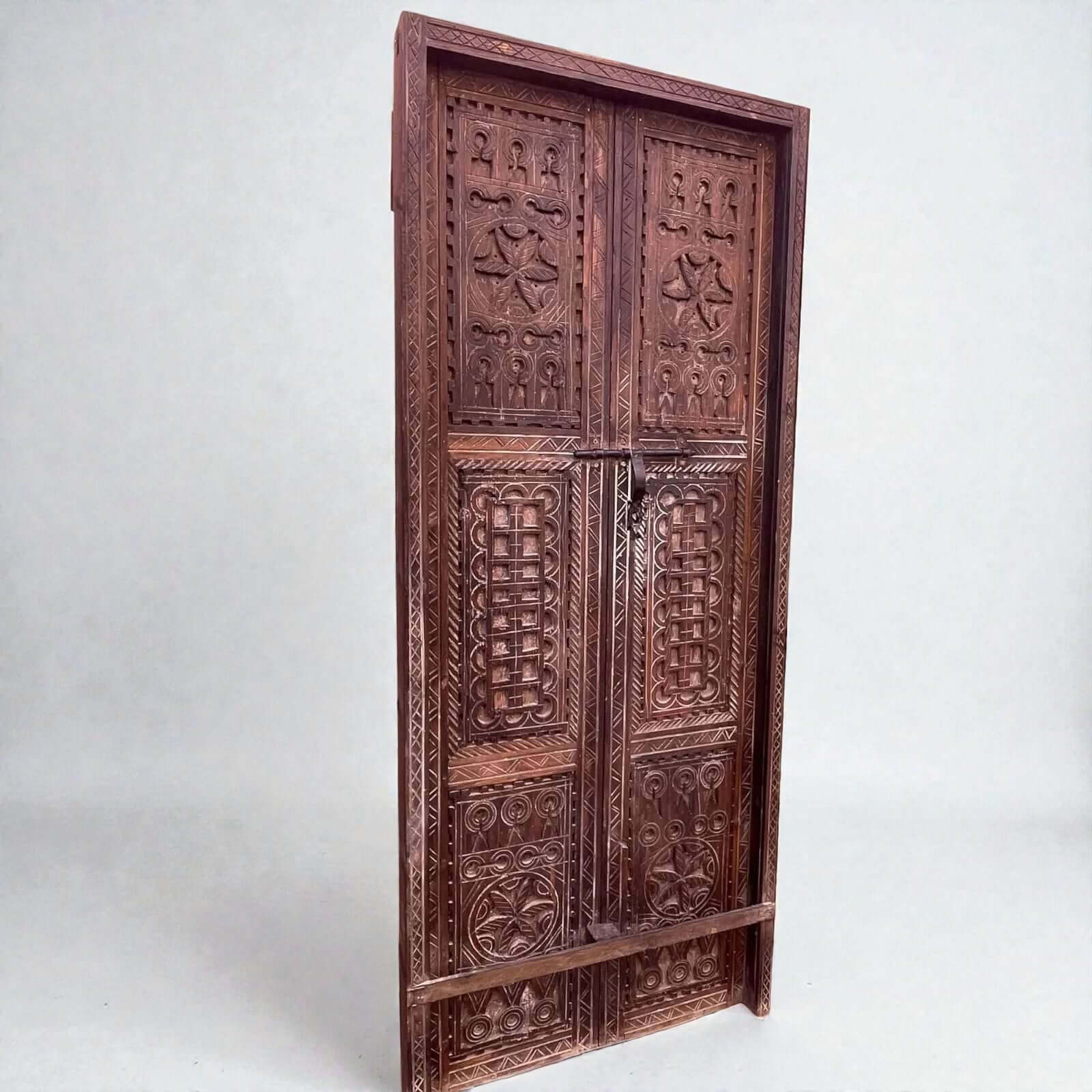 AtlasMuseCrafts hand-carved wooden double panel door with intricate geometric motifs in natural wood finish.