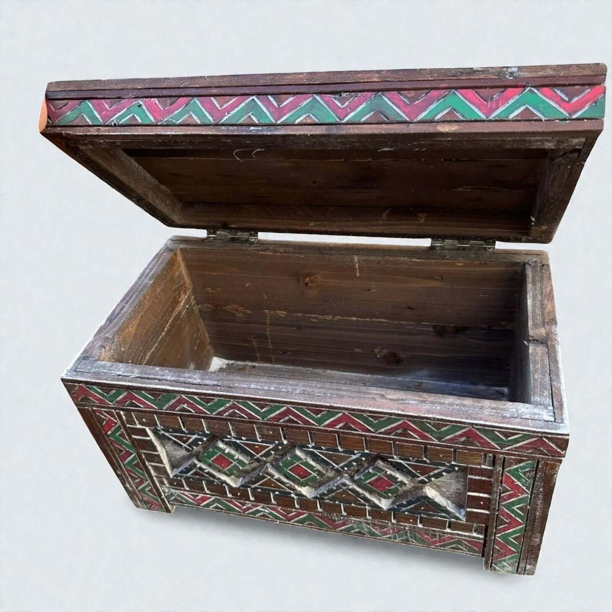 Rustic wood cabinet with colorful Moroccan Berber carving