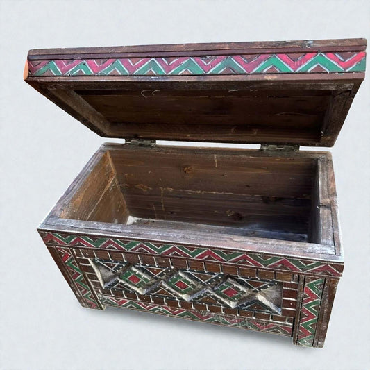 AtlasMuseCrafts handmade wooden storage chest with carved Berber patterns in red, green, and white. Rustic boho style.