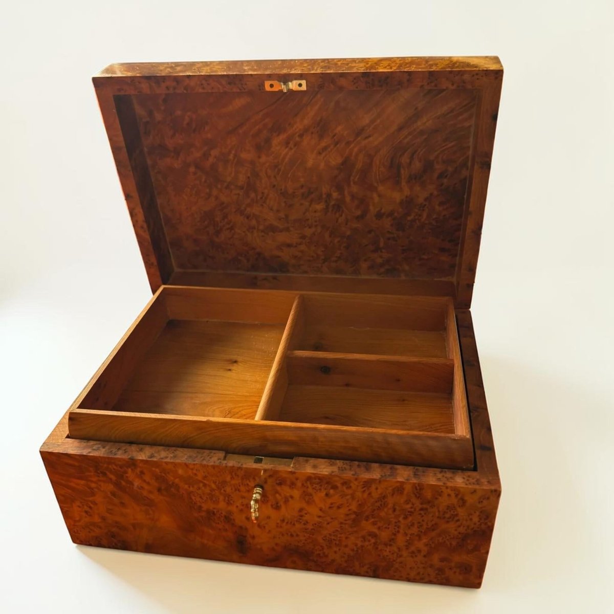 Open Moroccan burl wood jewelry box with compartments and natural Thuya grain