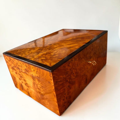 Moroccan Thuya burl wood jewelry box with swirling amber grain and keyhole detail