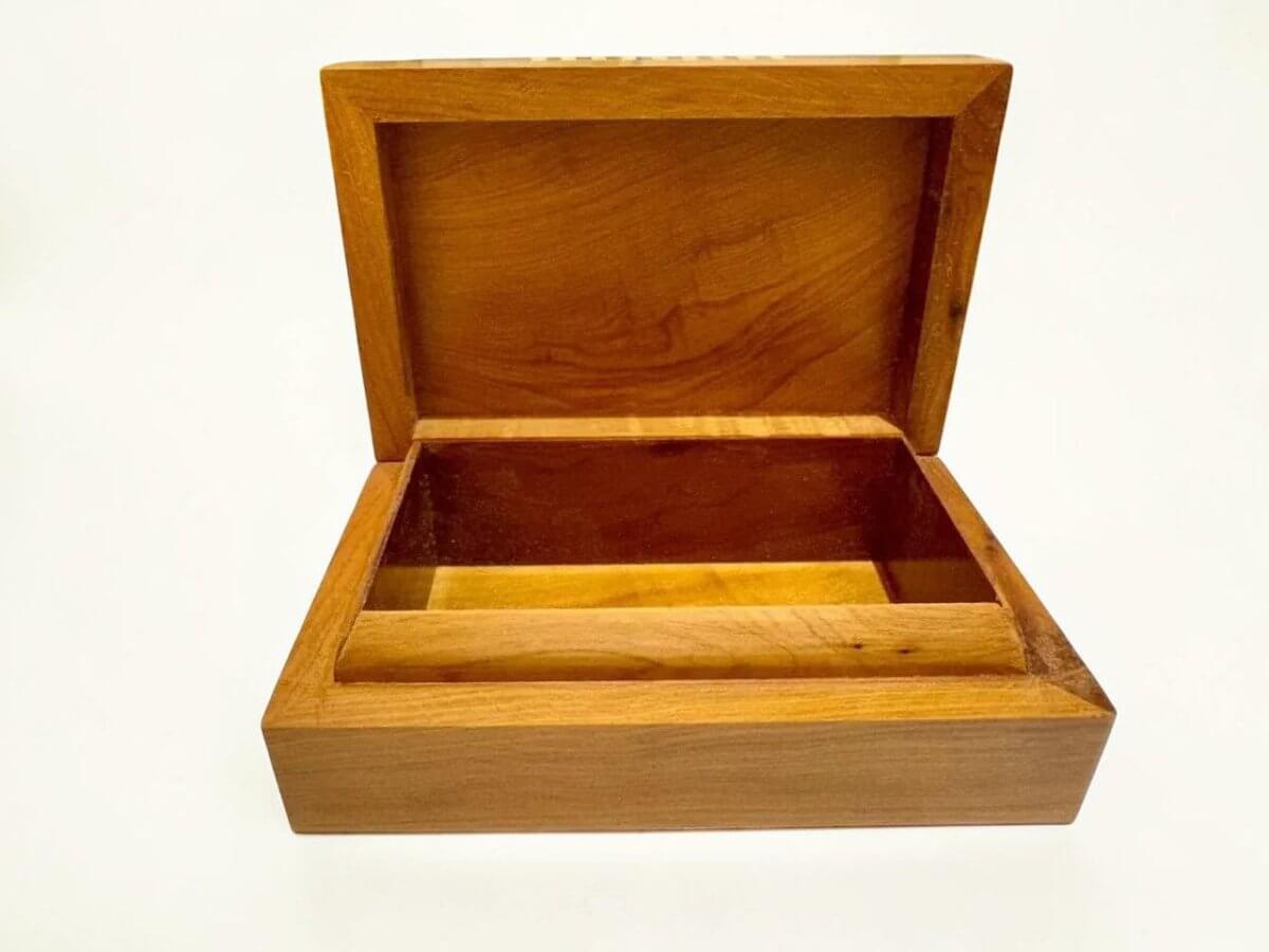 Handcrafted burl wood jewelry organizer, Moroccan Thuya jewelry box with open lid, elegant storage for accessories.
