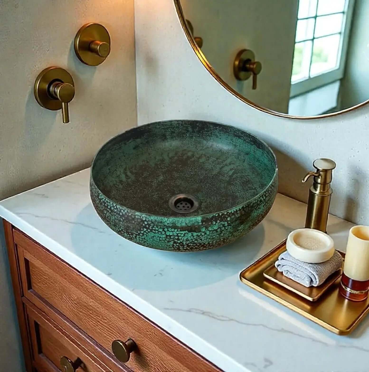 Coppera Studio green patina copper vessel sink with hammered texture and dark speckles. Round bowl design.