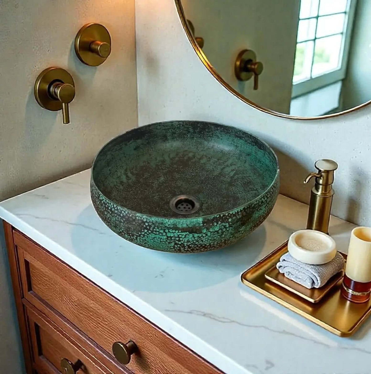 Coppera Studio green patina copper vessel sink with hammered texture and dark speckles. Round bowl design.