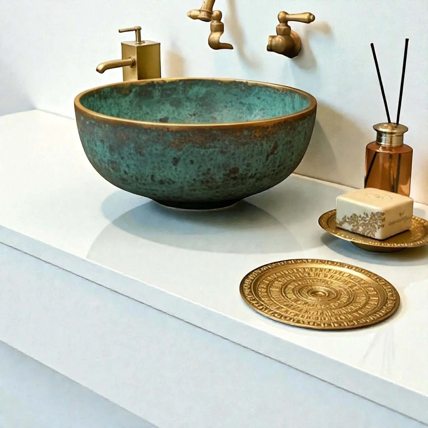 hammered copper vessel sink displayed on a modern countertop with decorative accessories and stylish faucet.