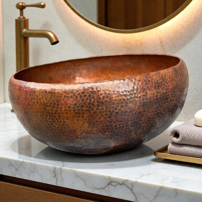 Hammered Brown Copper Vessel Sink displayed on a marble countertop with a modern faucet in a stylish bathroom.