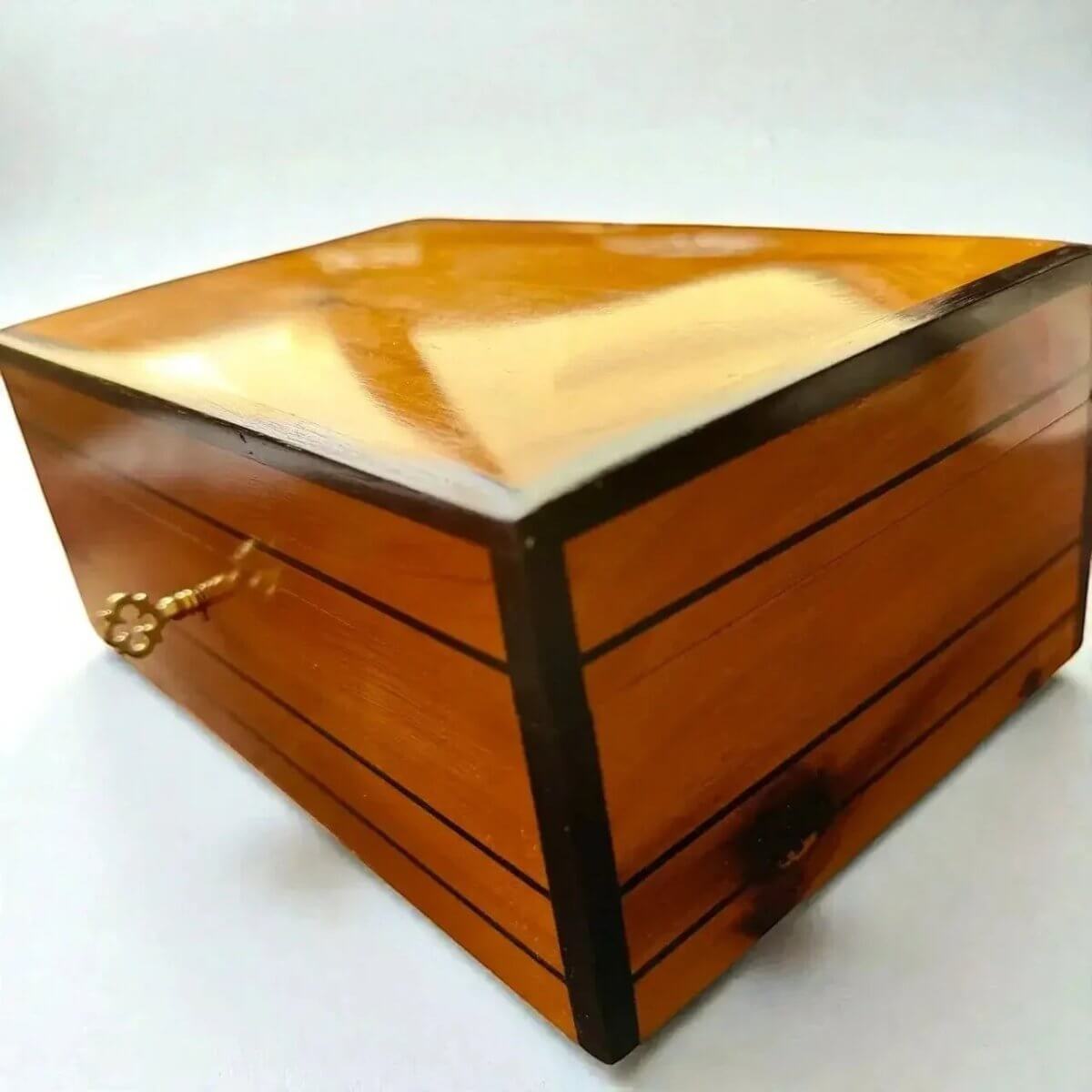 Decorative Wooden Keepsake Box made of polished Thuya burl wood with elegant brass clasp and vintage charm.