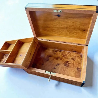 Interior view of a Decorative Wooden Keepsake Box made from Thuya burl wood with compartments for jewelry storage.