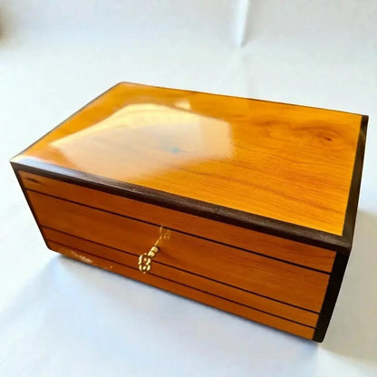 Decorative Wooden Keepsake Box in polished Thuya wood with brass clasp, ideal for jewelry or treasures.