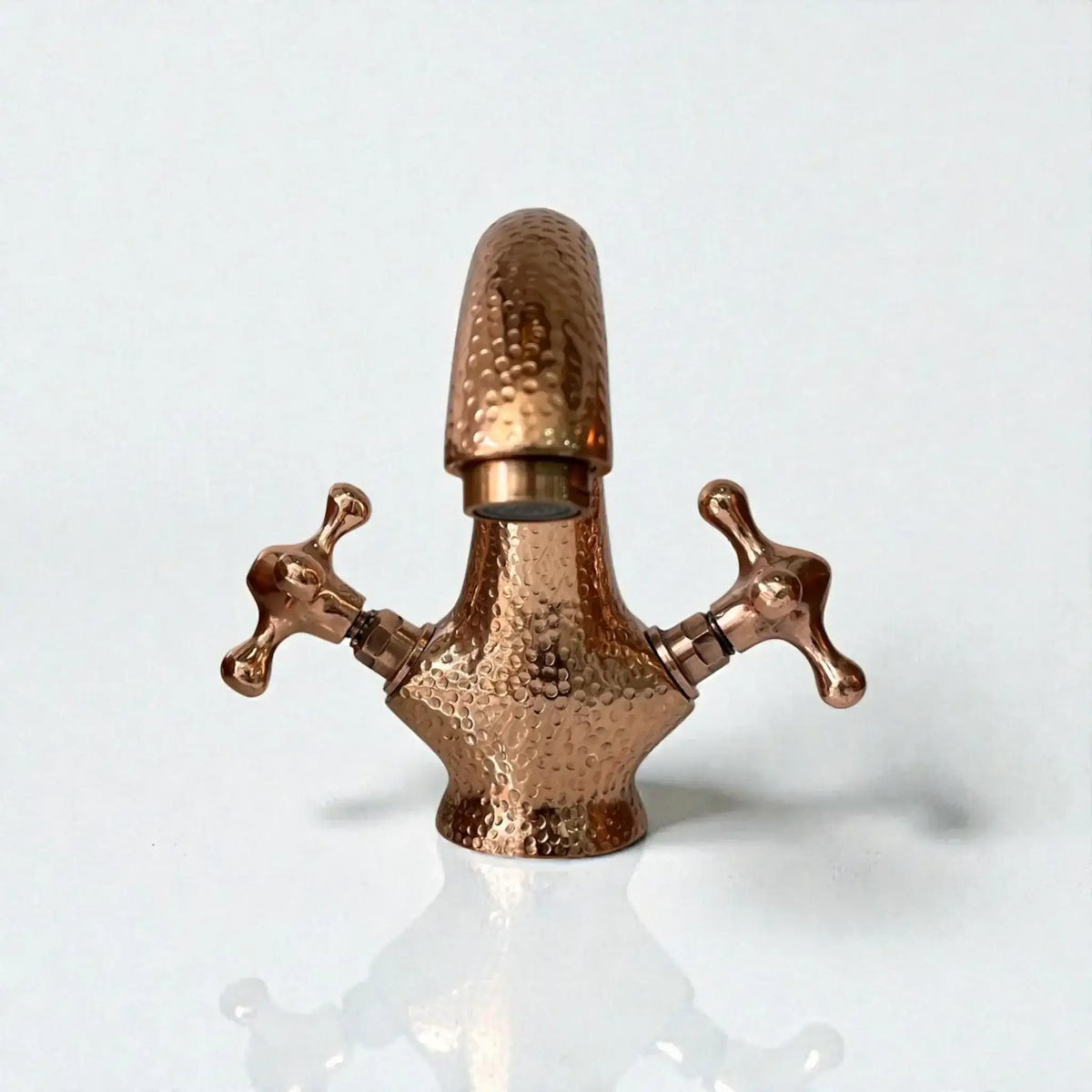 Farmhouse Copper Bathroom Faucet featuring handcrafted design and vintage knobs.