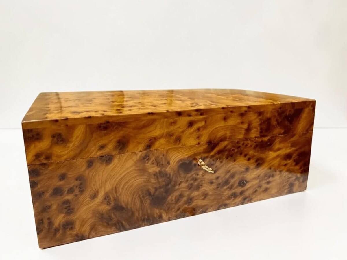 Brass lock and key on handmade Thuya burl jewelry box