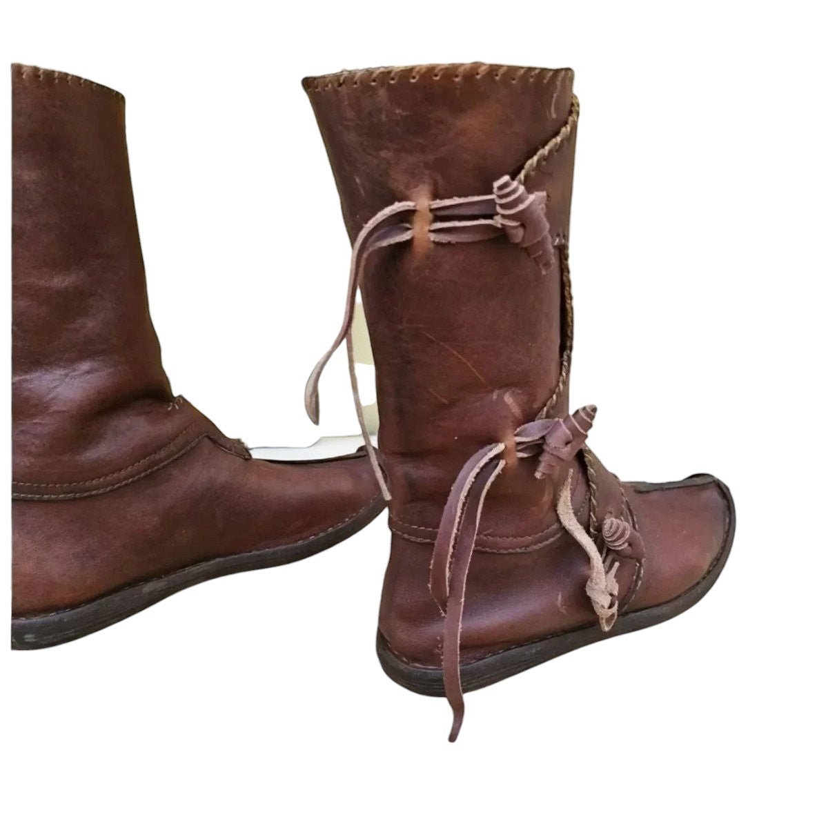 AtlasMuseCrafts handmade brown full-grain leather Viking boots with decorative lacing and ties. Medieval and Renaissance style.