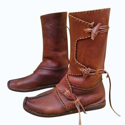 AtlasMuseCrafts handmade brown full-grain leather Viking boots with decorative stitching and tie closures. Medieval and Renaissance style.