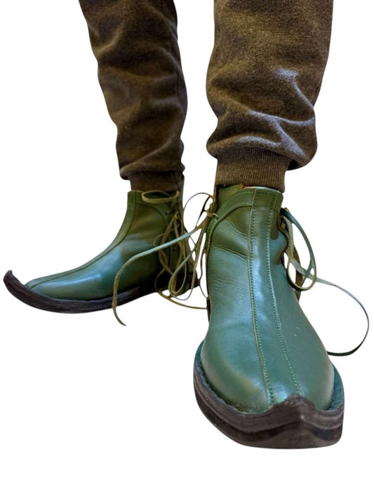 AtlasMuseCrafts handmade green leather Viking shoes with toggle closure, ideal for cosplay and historical reenactment.