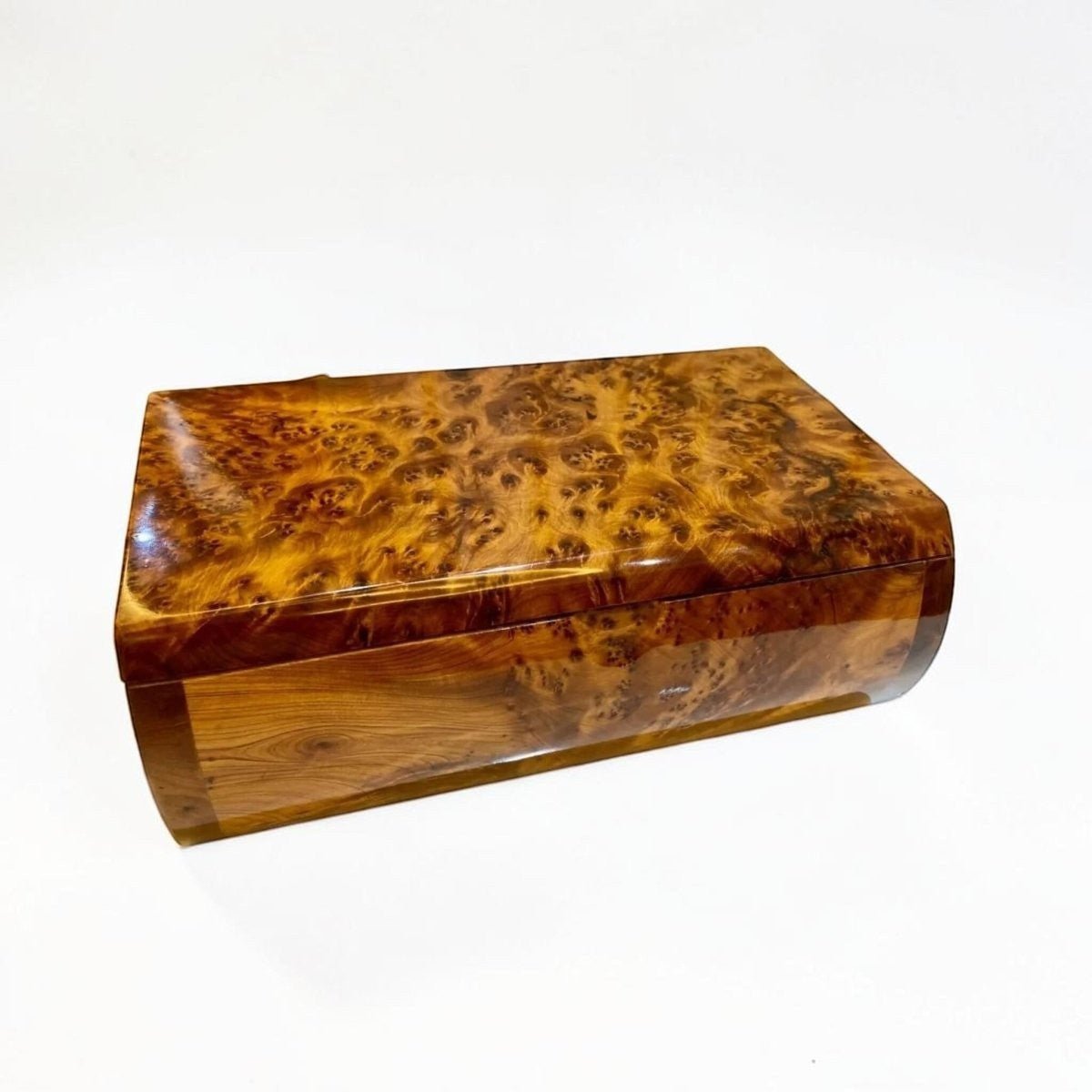 Handmade Thuya wood jewelry box with multi compartment interior and brass lock
