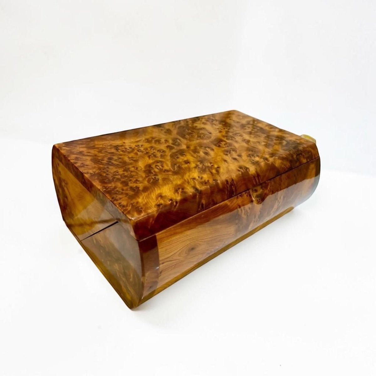 Open Thuya burl wood jewelry box with divided interior and polished finish