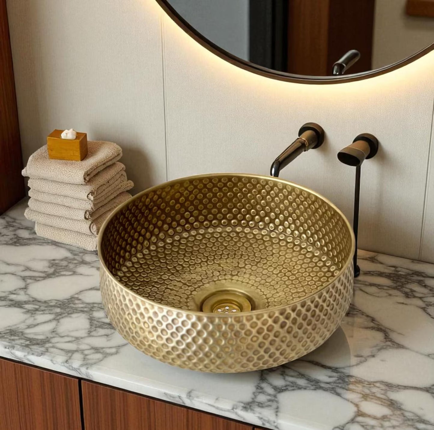 oxidized copper sink installed on bathroom vanity
