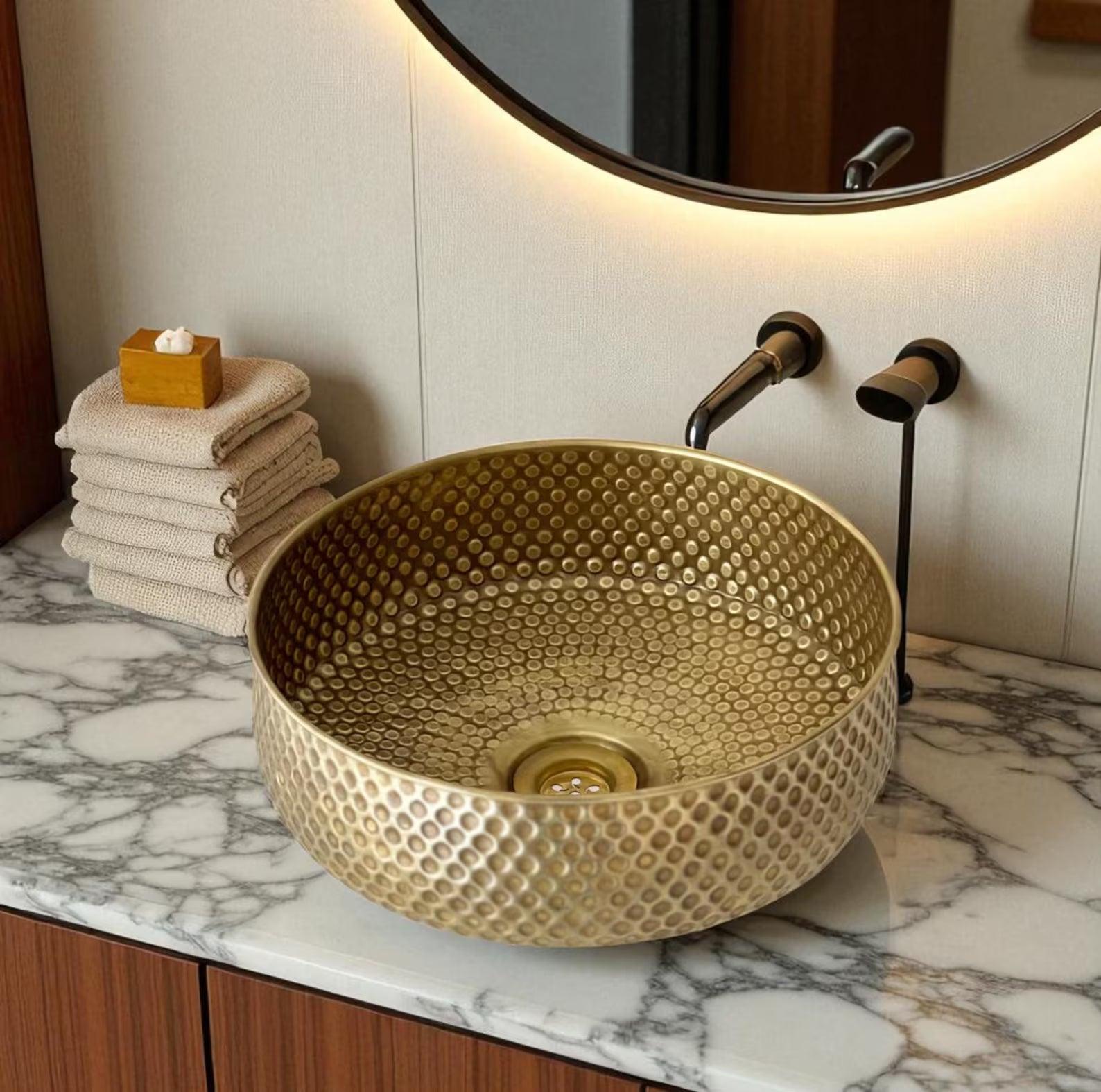 oxidized copper sink installed on bathroom vanity
