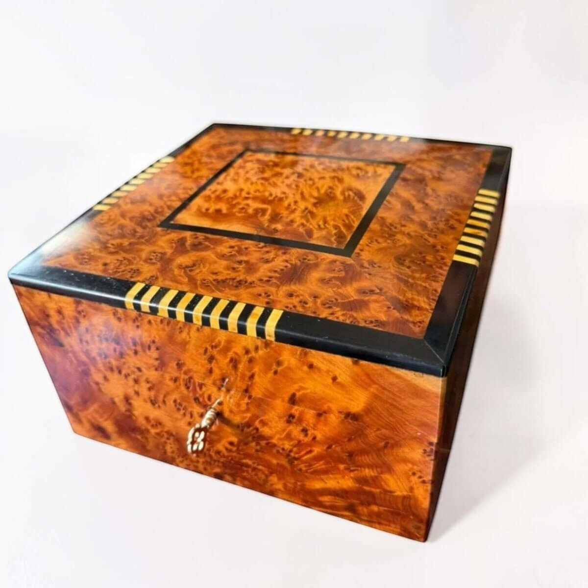 Handmade jewelry box organizer made from Moroccan Thuya burl wood with decorative inlay design.